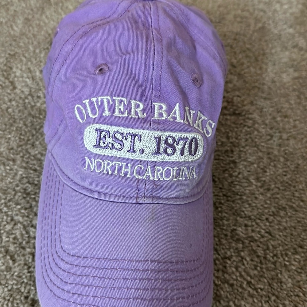 purple baseball cap